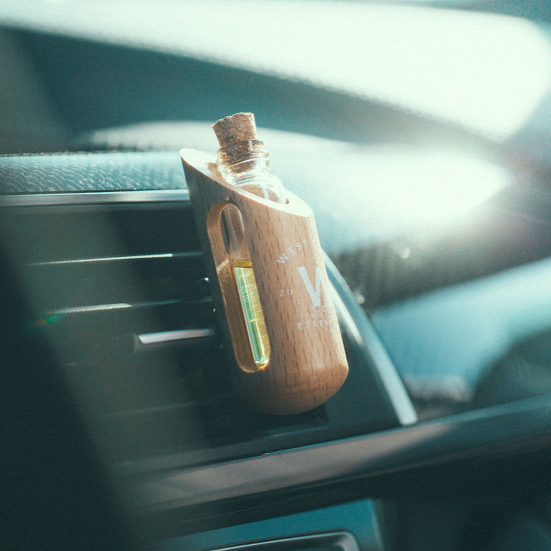 Natural car freshener with essential oils and dried botanicals in eco-friendly packaging